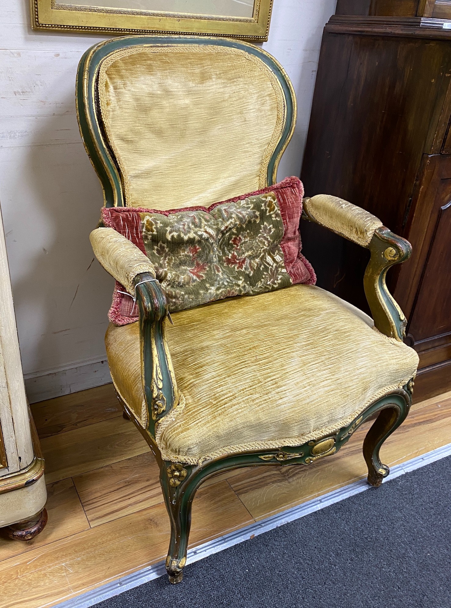 A 19th century French upholstered elbow chair, re-painted, width 60cm, depth 64cm, height 85cm